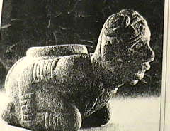 Stone carving of Negroid person